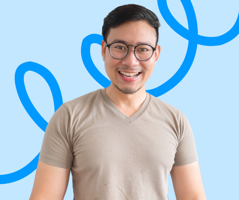 A happy man smiling with glasses